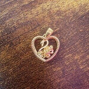 Elegant Heart-Shaped Pendant with Swan Design